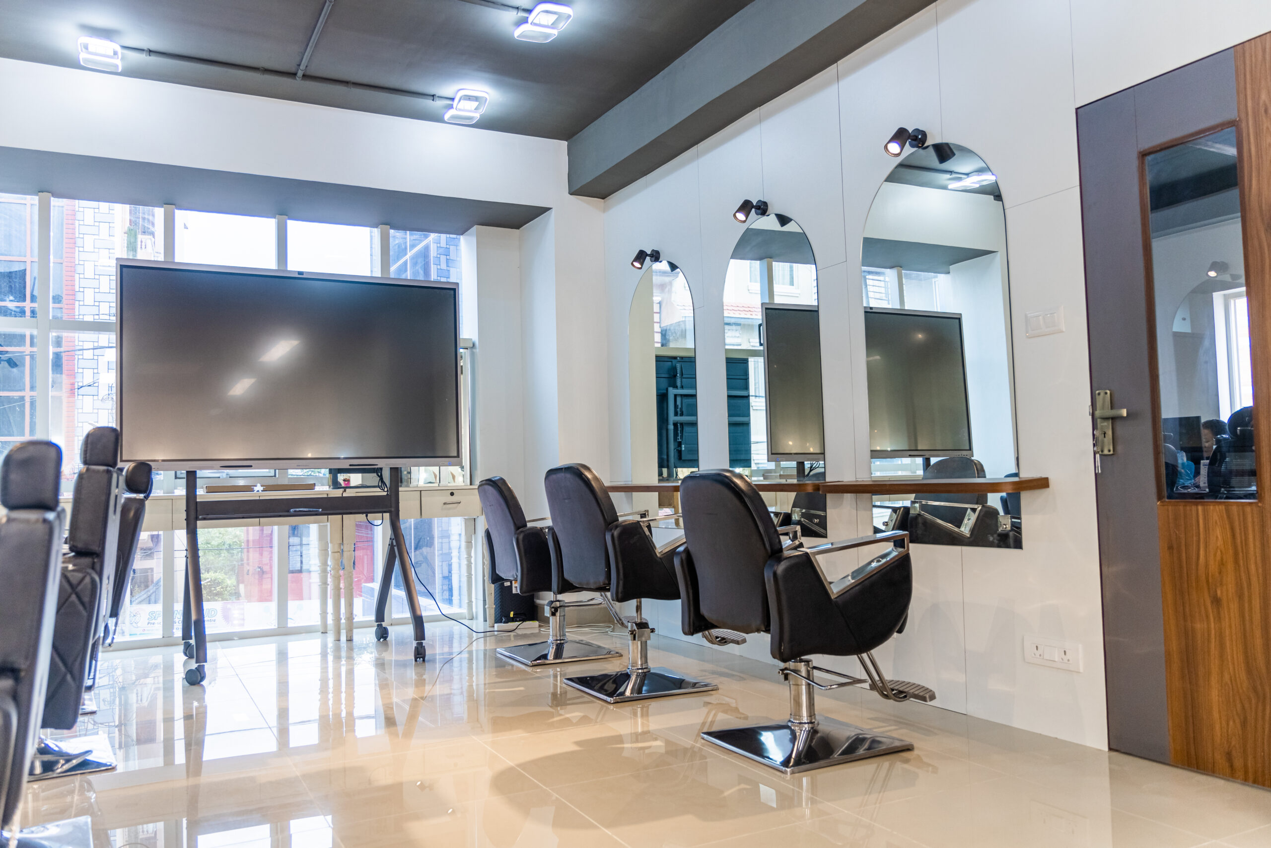 Modern Salon Setup for Salon Management Certification Training with Styling Chairs and Mirrors